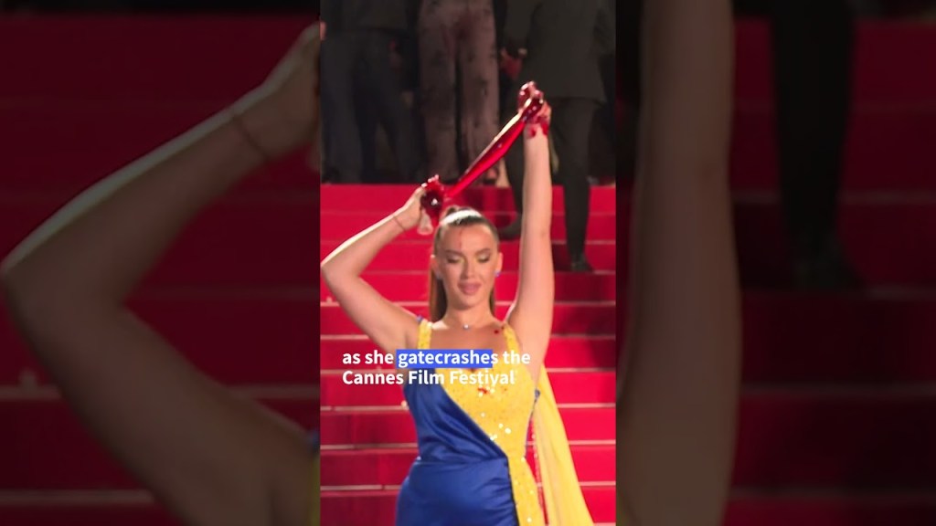 Protester pours fake blood on herself at Cannes Film Festival | AFP&nbsp;#shorts