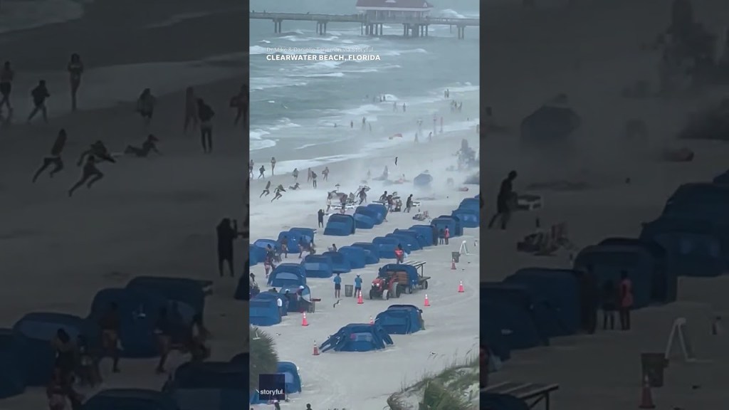 Footage captures waterspout ripping through crowded beach&nbsp;#Shorts